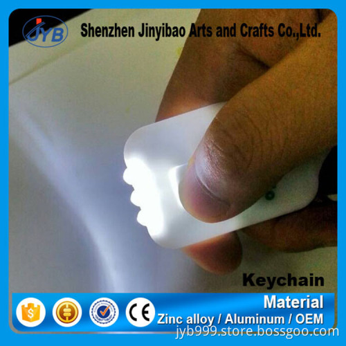 hot sale product plastic ABS solar power LED keychain with custom logo